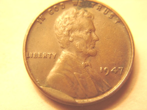 1947-P--Wheatback--Obverse-Cud